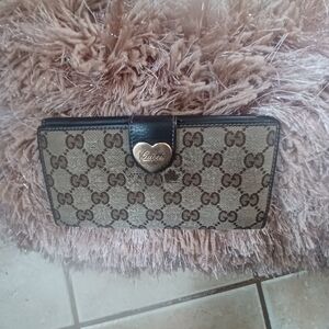 Gucci Monogram Wallet with Heart Clasp